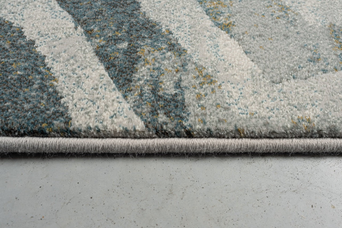 Seitenansicht von Kurzflor und Kante des Teppichs Tapison Home Torino 063.0990.4299