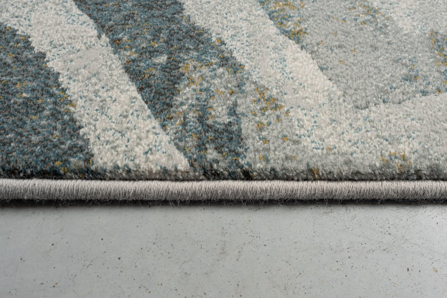 Seitenansicht von Kurzflor und Kante des Teppichs Tapison Home Torino 063.0990.4299