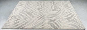 Teppich Tapison Home Torino 063.0990.6797 auf dem Boden liegend, schräg gesehen