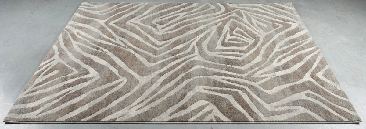 Teppich Tapison Home Torino 063.0990.9243 auf dem Boden liegend, schräg gesehen