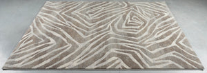 Teppich Tapison Home Torino 063.0990.9243 auf dem Boden liegend, schräg gesehen