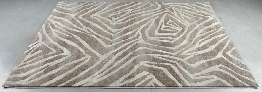 Teppich Tapison Home Torino 063.0990.9243 auf dem Boden liegend, schräg gesehen