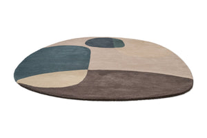 Brink & Campman Decor Miller Winter Teppich in Petrolblau, Rosébeige und Anthrazitbraun, Schrägansicht