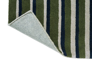 Brink & Campman Decor Pilar Moss Teppich, Detail von umgeschlagener Ecke und Rücken
