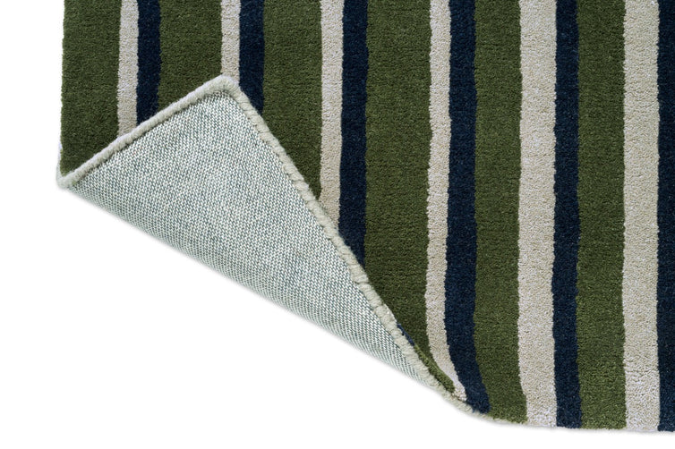 Brink & Campman Decor Pilar Moss Teppich, Detail von umgeschlagener Ecke und Rücken