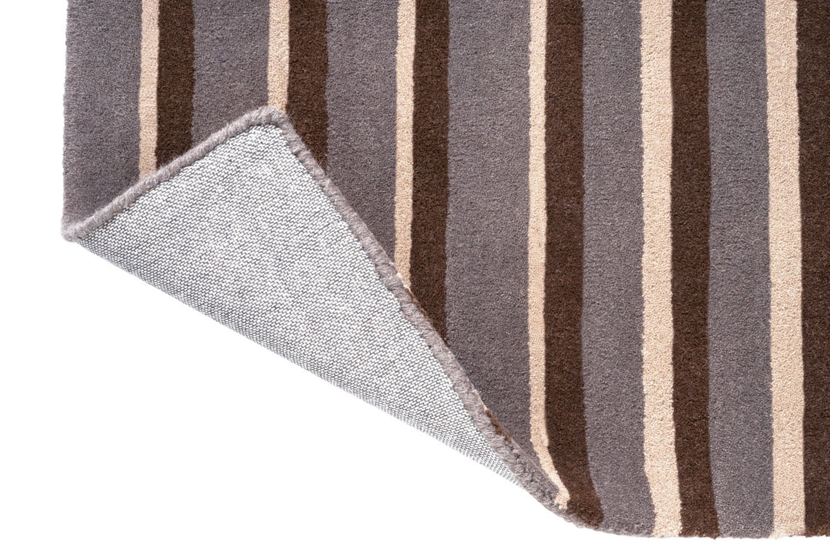 Brink & Campman Decor Pilar Taupe Teppich, Detail von umgeschlagener Ecke und Rücken