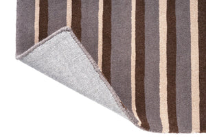 Brink & Campman Decor Pilar Taupe Teppich, Detail von umgeschlagener Ecke und Rücken