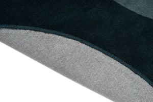 Brink & Campman Element Lane Blue Teppich, Detail von umgeschlagener Kante und Rücken