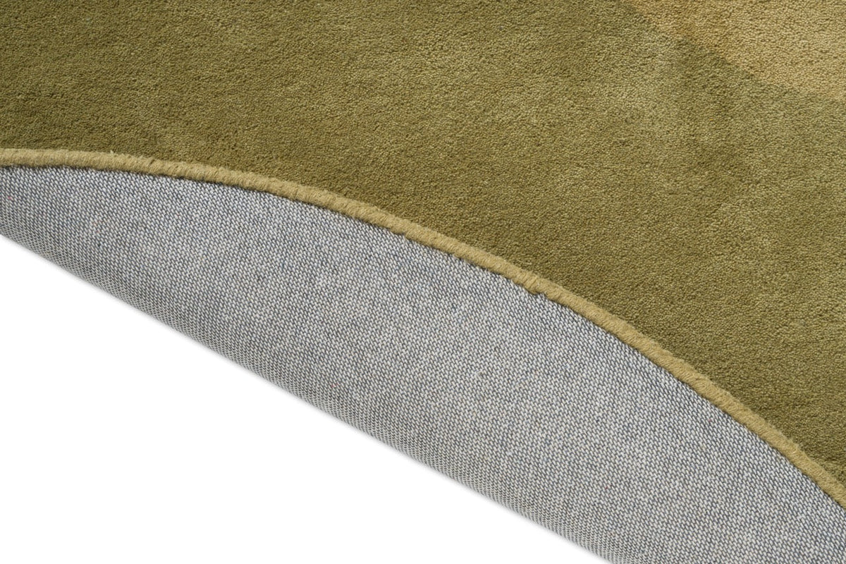 Brink & Campman Element Lane Green Teppich, Detail von umgeschlagener Kante und Rücken