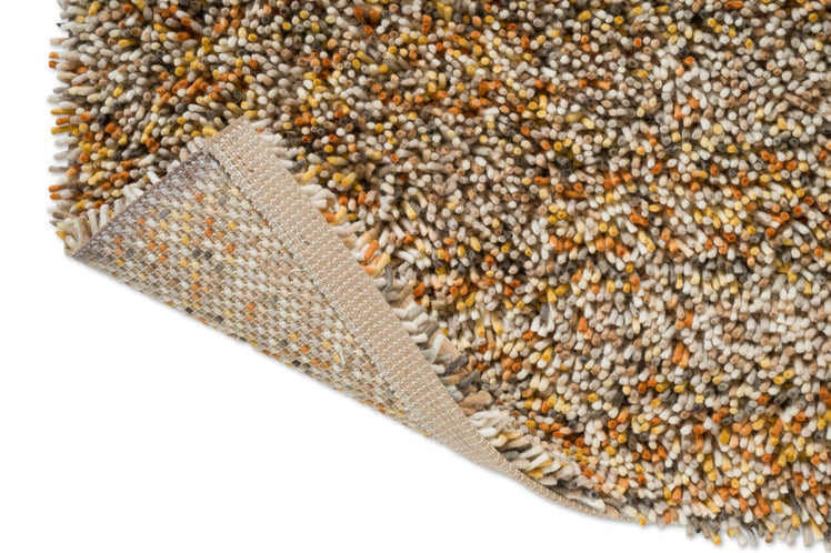 Brink & Campman Loom Calendula Teppich, Detail von umgeschlagener Ecke und Rücken
