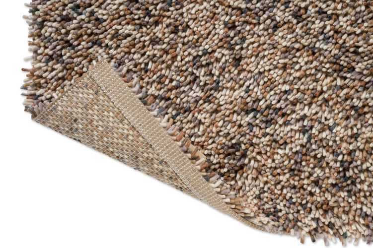Brink & Campman Loom Natural Teppich, Detail von umgeschlagener Ecke und Rücken