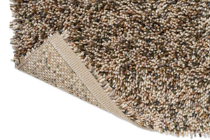 Brink & Campman Loom Natural Moss Teppich, Detail von umgeschlagener Ecke und Rücken
