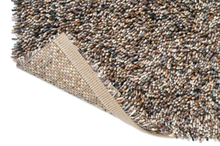 Brink & Campman Loom Natural Storm Teppich, Detail von umgeschlagener Ecke und Rücken