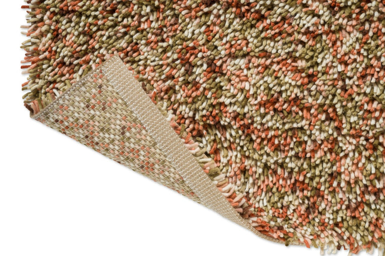 Brink & Campman Loom Pumpkin Teppich, Detail von umgeschlagener Ecke und Rücken