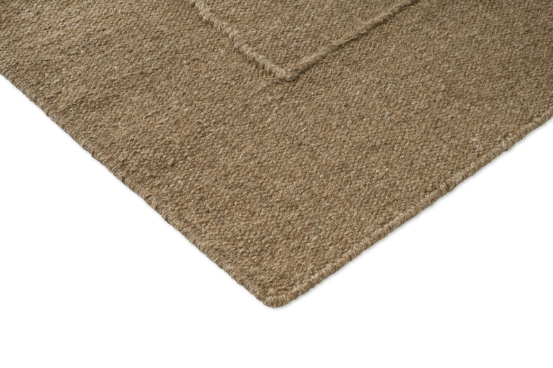 Brink & Campman Senso Blocks Fur Brown Teppich, Detail von Ecke und Gewebe