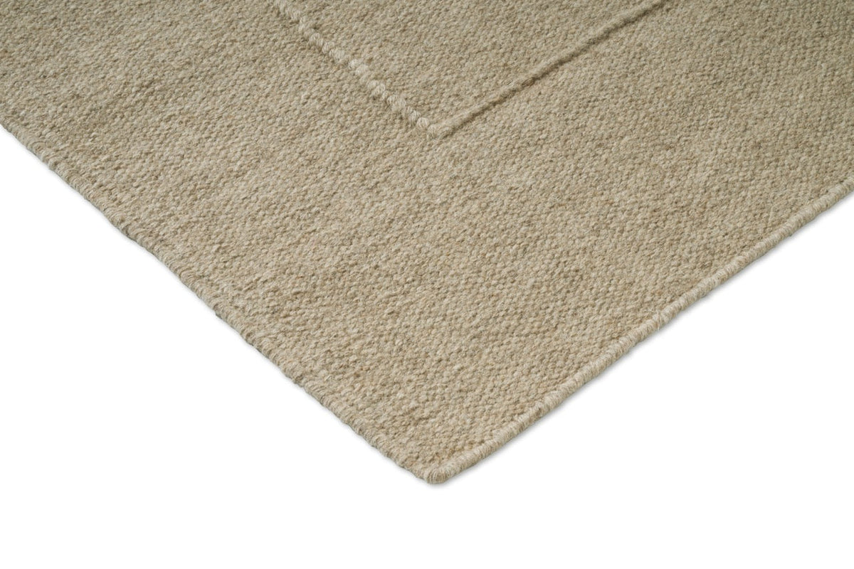 Brink & Campman Senso Blocks Natural Teppich, Detail von Ecke und Gewebe