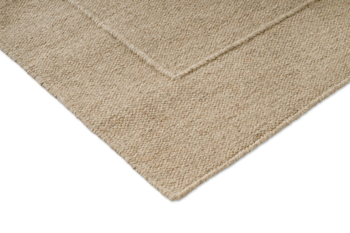 Brink & Campman Senso Border Natural Teppich, Detail von Ecke und Gewebe