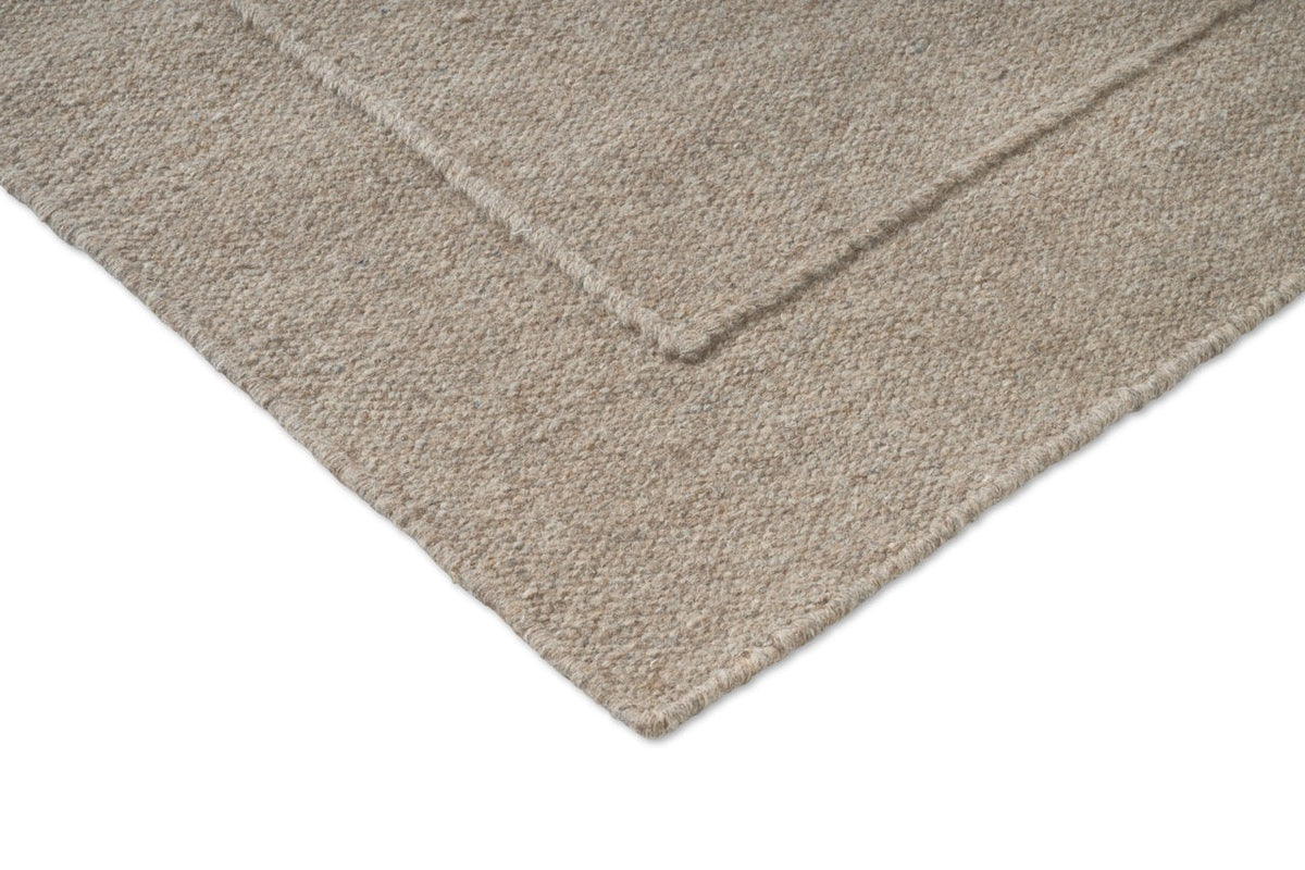 Brink & Campman Senso Planes Soft Taupe Teppich, Detail von Ecke und Gewebe