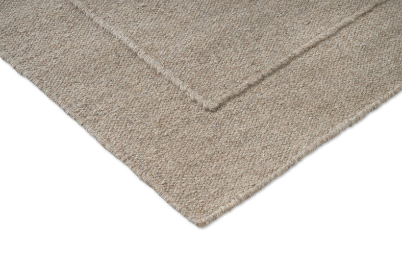 Brink & Campman Senso Planes Soft Taupe Teppich, Detail von Ecke und Gewebe