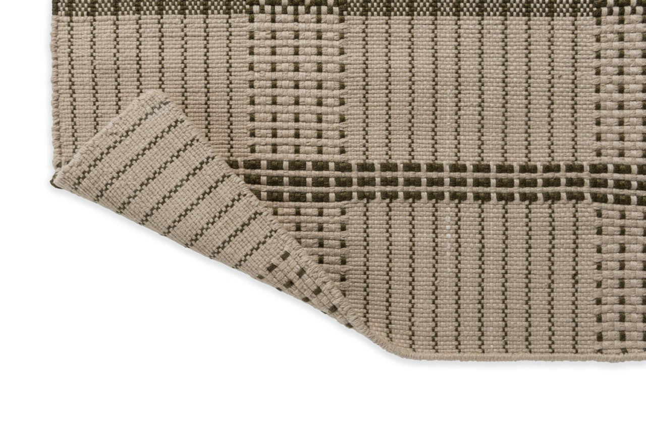  Detail photo of olive stitched design on neutral beige flatweave texture