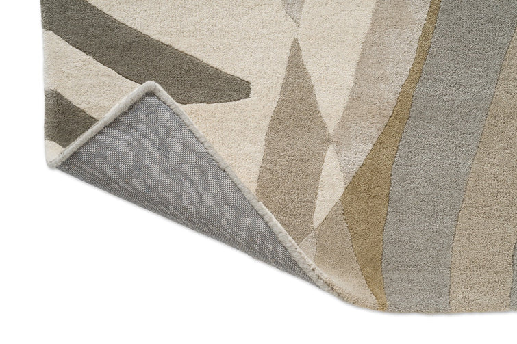 Harlequin Atelier Pebble Teppich, Detail von umgeschlagener Ecke und Rücken