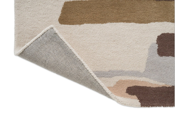Harlequin Zeal Taupe Teppich, Detail von umgeschlagener Ecke und Rücken