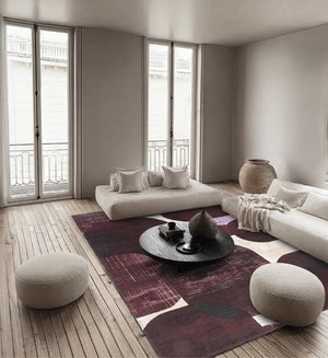 Acsento Bubbles Burgundy Teppich in Bordeaux mit runden Formen in Weinrot und Aubergine auf Elfenbein, im Wohnraum